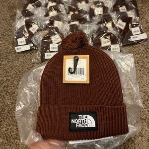 The north face “box logo Pom beanie” brown